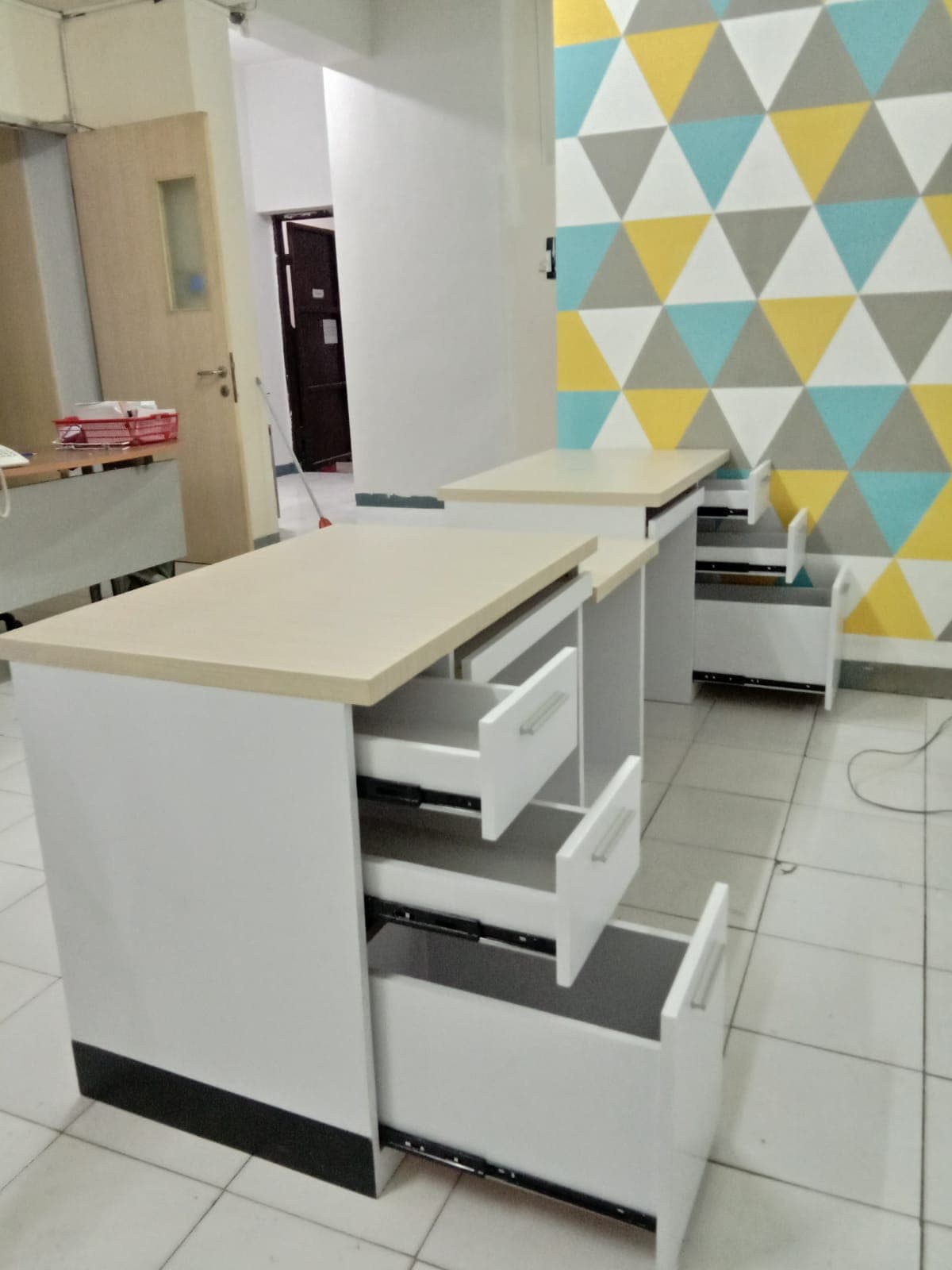 Office Reception Storage Cabinet – Geometric Accent Wall